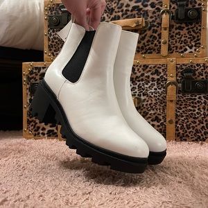 Brand new, never worn. Similar to doc martins